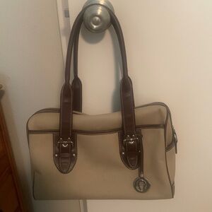 Etienne Aigner purse. Poly canvaslike material and manmade leather like trim.